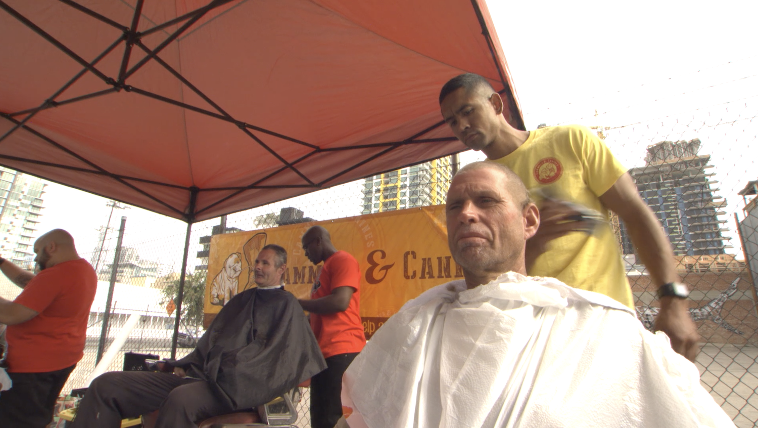 Cammies and Canines CEO and Founder gives haircuts to the homeless
